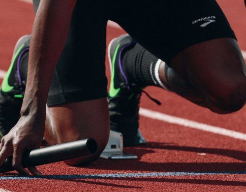 Relay runner on the starting block
